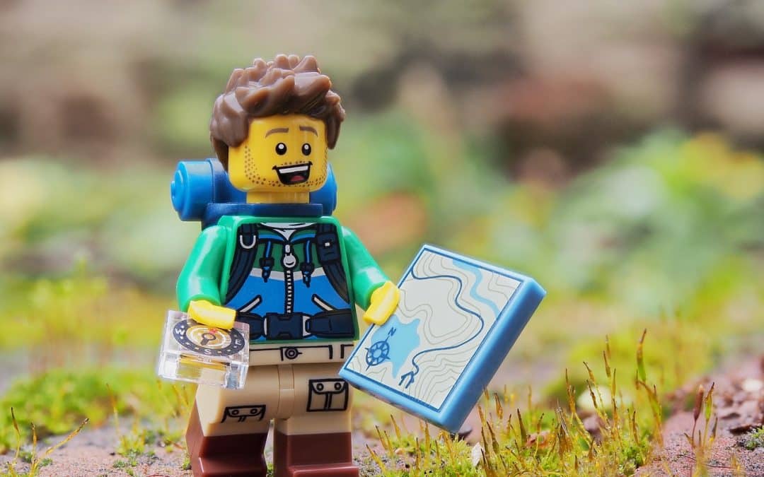 lego-hiker-figure-with-map-and-compass